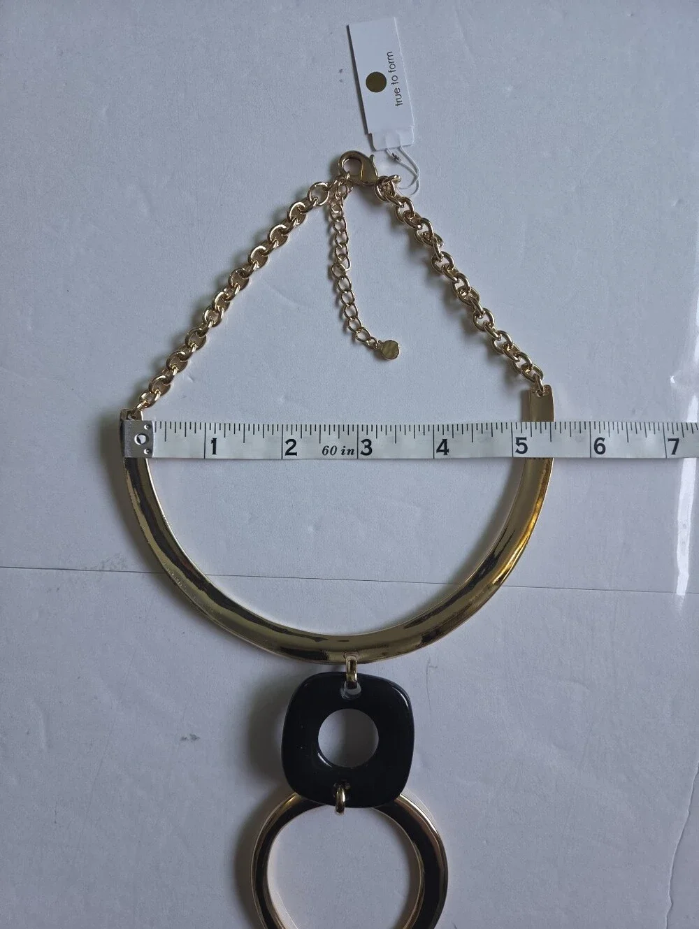 True To Form Gold-Tone Statement Necklace with Black Pendant